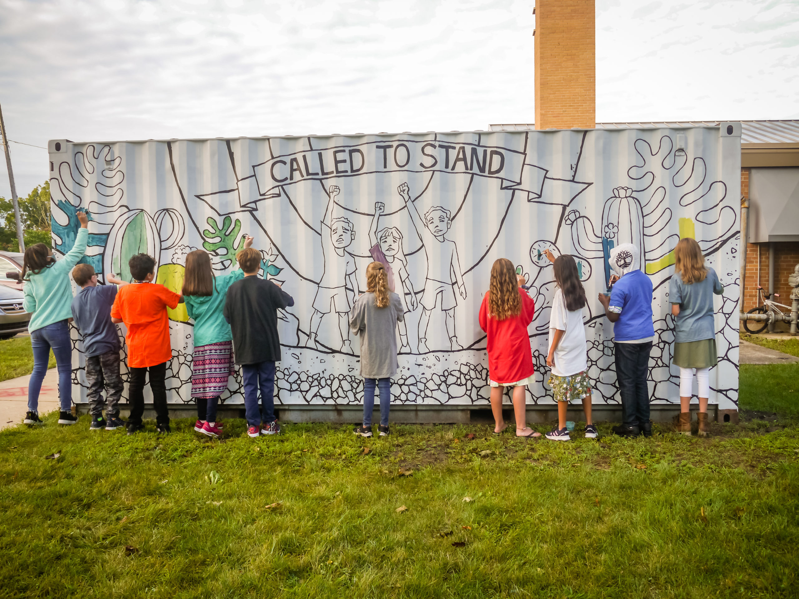 kids outside painting