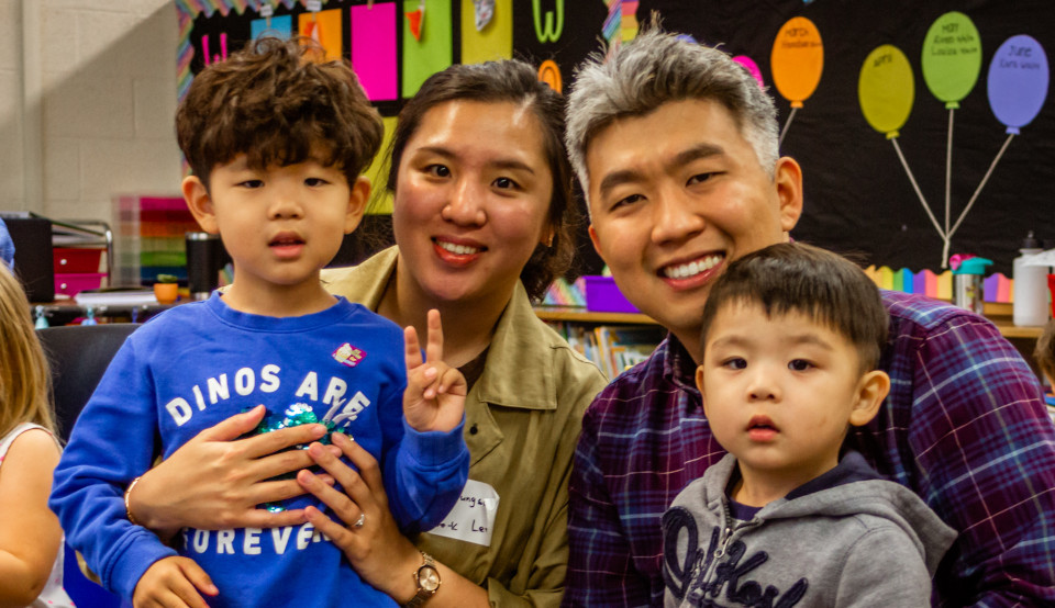 a family of 4 with two young boys